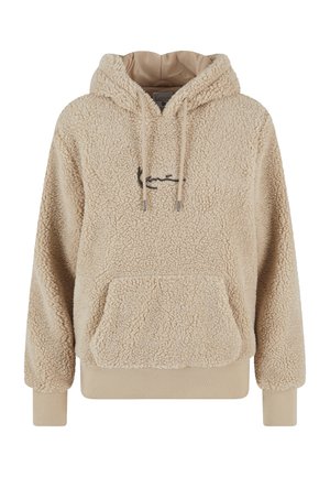 Kreemika värvi sherpa-fliisist kapuutsiga dressipluus esitasku, nööridega, soonikkoes varrukasäärte ja väikese rinnal asuva borduuritud logoga.