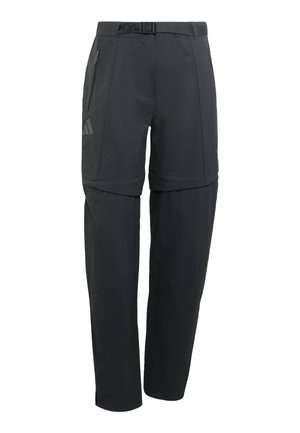 Černé kalhoty s texturovanou látkou, vybavené páskem, kapsami na zip a zúženým střihem. Obsahují možnost složení nohavice.