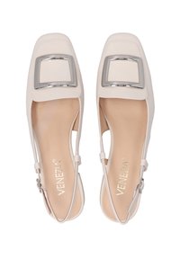 White leather flats with a square toe design, featuring a metallic square buckle accent and ankle strap for secure fit. Smooth interior texture.