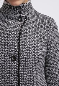 Sisley Halflange jas - black