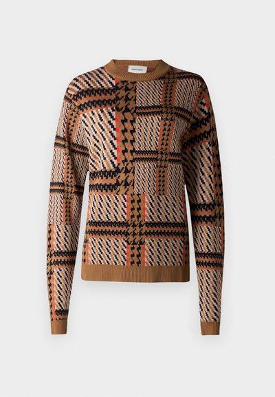 Rudas raštuotas megztinis su languotais ir geometriniais raštais juodos, raudonos ir grietinėlės spalvų. Baigtas su banguotu kaklu ir apvadu.