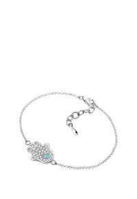Silverfärgad kedjearmband som har ett detaljerat handformat hänge med klara rhinestones och en blå accentsten.