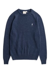 Sweater bleu marine en tissu tricoté doux, avec un col rond et des bords côtelés. Petit emblème d'arbre blanc sur la poitrine.