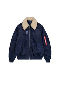Marineblå bomberjakke med en cremet faux fur-krave, lynlås, sidelommer, elastiske manchetter og et rødt mærke på ærmet. Glat, blankt stof.