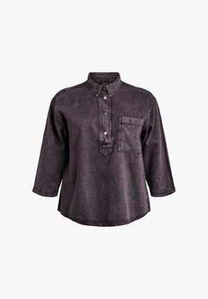 Black denim shirt with a collar, three-quarter sleeves, button placket, and a chest pocket. Features visible stitching and a relaxed fit.