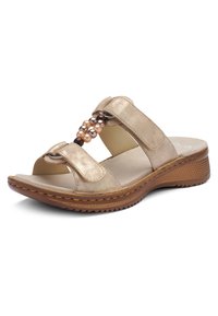 Beige sandal med åben tå, to justerbare remme og dekorative brune og ferskenfarvede perler på den forreste rem, med en tekstureret brun sål.