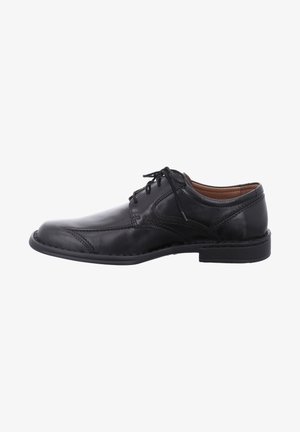 Schwarze Leder-Formal Schuhe mit einem eleganten Design, runder Zehenpartie, Schnürverschluss und dekorativer Ziernaht an den Seiten. Flache Gummisohle.