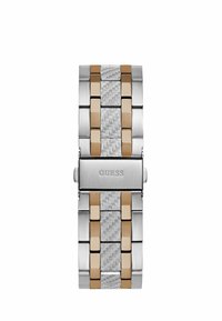Bracciale in acciaio inossidabile con maglie alternate lucide dorate e spazzolate argentate, caratterizzate da una texture intrecciata. Chiusura con marchio incisa.