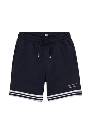 Mørkeblå træningsshorts med elastisk linning, snørebånd, sidelommer, hvidstribet kant og lille trykt tekst på venstre ben.