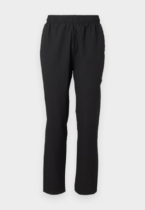 Černé, lehké kalhoty s elastickým pasem, rovného střihu a strukturovanou tkaninou, bez viditelných zapínání nebo kapes.