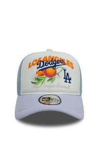 White baseball cap with blue mesh sides. Features orange "LOS ANGELES" and blue "Dodgers" text, orange fruit graphic, and "LA" logo. Adjustable strap.