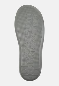 Gray rubber sneaker insole featuring textured surface with raised dots, embossed "ENERGIA HUMANA" branding, and circular logo indicating size 42.
