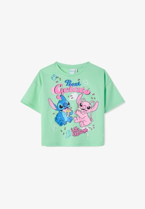 Maglietta verde menta per bambini con personaggi dei cartoni animati blu e rosa che mangiano gelato e testo "Il miglior gelato."