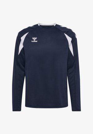 Maillot de sport à manches longues bleu marine avec des panneaux blancs aux épaules et sur les côtés, arborant un logo Hummel blanc sur le côté gauche de la poitrine.