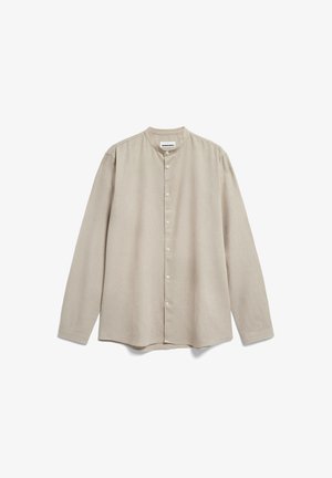Lichtbeige langemouwen shirt met een staande kraag, knoopsluiting aan de voorkant en een losse pasvorm. Gemaakt van een gestructureerde stof met een subtiele drape.