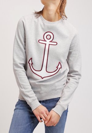 Light gray sweatshirt featuring a large embroidered red anchor design on the front. Cotton blend fabric with ribbed cuffs and neckline.