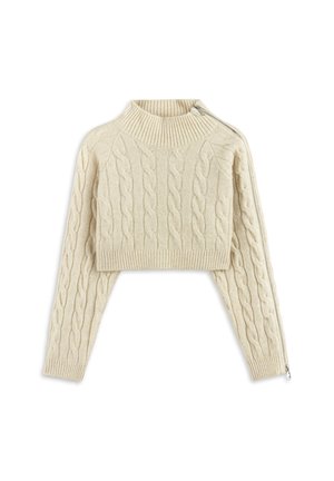 Pull court couleur crème avec un motif en maille torsadée, col et poignets côtelés, présentant un détail de zipper argenté sur l'épaule gauche.