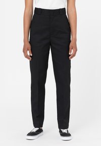 Svarta byxor med high waist, slät front, sidofickor och bälteshällor. Tillverkade av ett slätt tyg med rak benform.