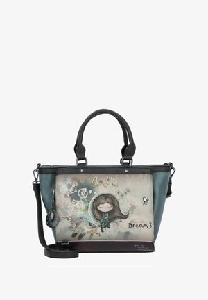 Tasche aus teal- und schwarzem Kunstleder, mit einem Cartoon-Graphic auf hellem Hintergrund, silbernen Akzenten und abnehmbarem Gurt mit Anhänger.