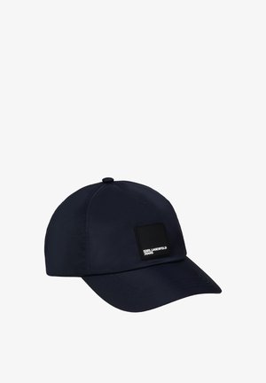 Cappellino da baseball blu navy scuro con visiera curva e una piccola toppa quadrata nera con testo bianco "Karl Lagerfeld Jeans".