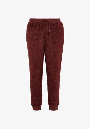 Jogging en polaire bordeaux avec une finition douce et texturée, taille élastique, détail de cordon de serrage et poignets côtelés aux chevilles.