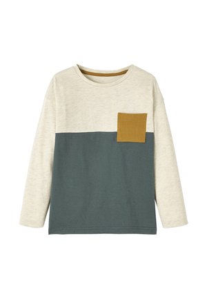 Long-sleeve color-block shirt with cream top, dark gray bottom, and mustard yellow chest pocket on a white background.