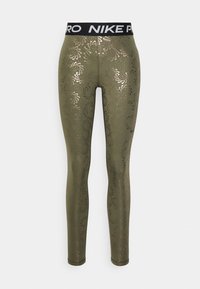 Oliwkowe legginsy sportowe z metalicznym kwiatowym wzorem, czarnym pasem z logo Nike Pro oraz dopasowanym, elastycznym krojem.