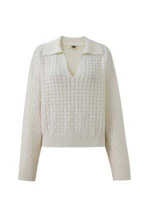 Pull en tricot de couleur crème avec un motif texturé, col en V et bords côtes. Présente un col classique et une coupe cropped.