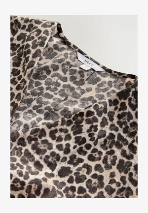 Fekete és világos bézs leopárdmintás top, V kivágással és sima textúrával, a nyakrésznél "NEXT" felirattal.