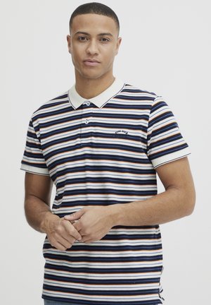 Striped polo shirt in navy, white, and orange. Material is cotton blend with a classic collar, featuring two buttons and embroidered logo detail.