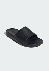 Black slide sandal with a wide upper strap, textured footbed, and a contoured sole. Made from synthetic material.