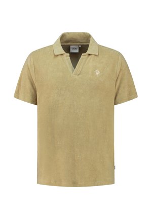 Short-sleeve polo shirt in soft beige terry cloth with a V-neck and a small embroidered logo on the chest. Smooth texture and relaxed fit.