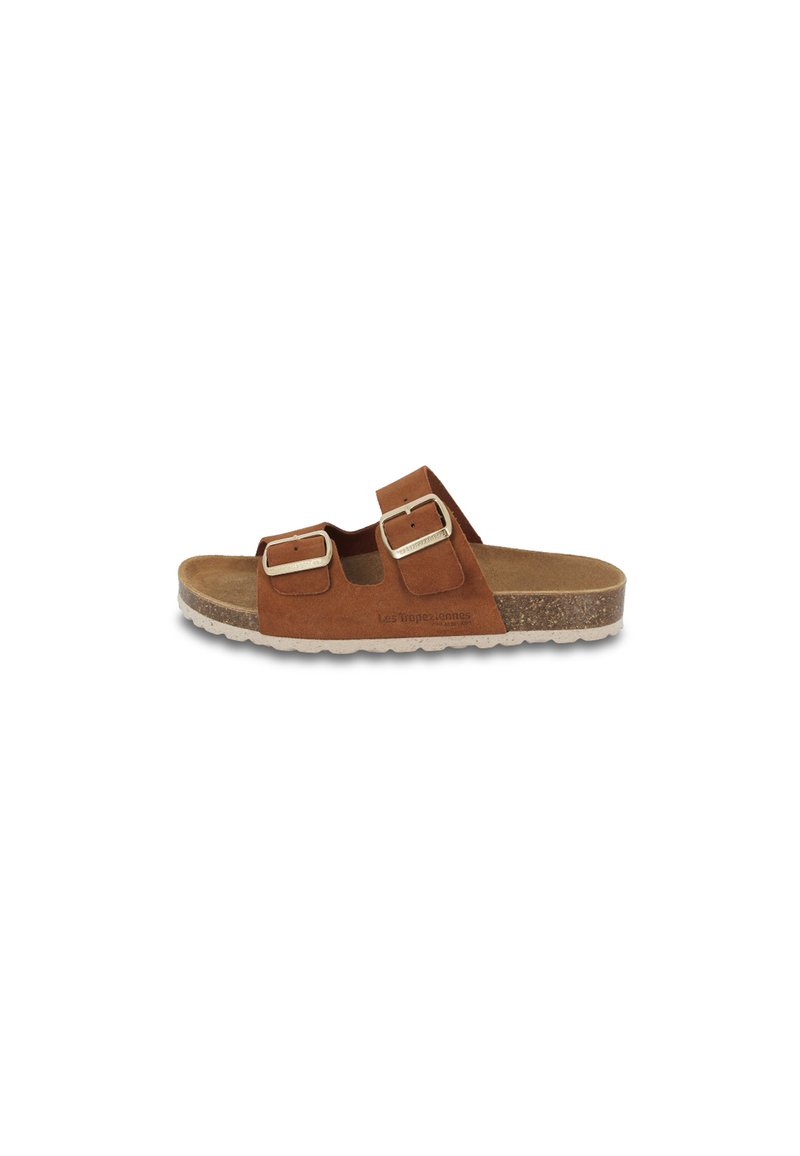 Brown suede slide sandal with two adjustable straps and silver buckles. Cork-like sole with textured surface for grip and comfort.