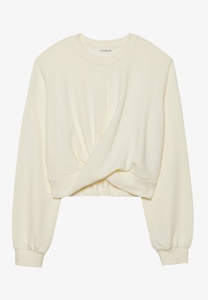 Kremfarget, kort sweatshirt med lange, tettsittende ermer. Har en vridd detalj foran og en ribbestrikket nederkant. Myk, glatt tekstur.