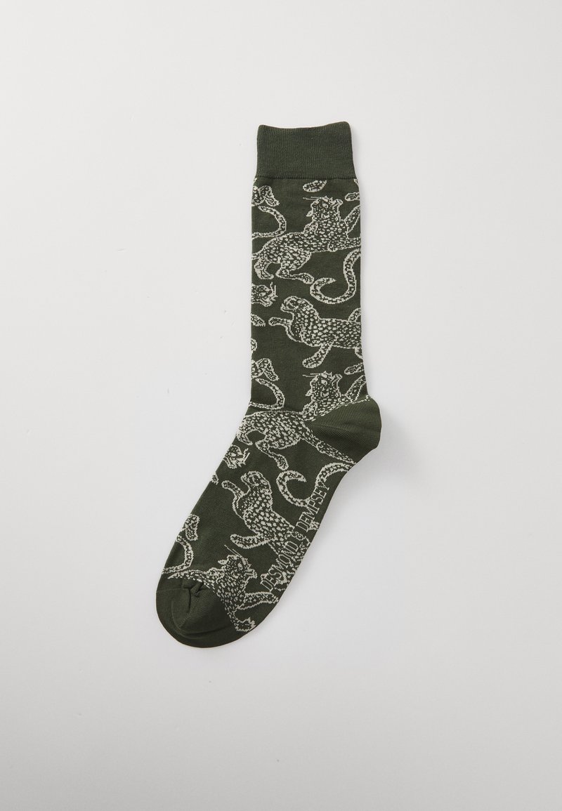 Meia de algodão verde com um padrão de leopardo em branco. Apresenta um punho canelado e uma textura suave com biqueira reforçada.