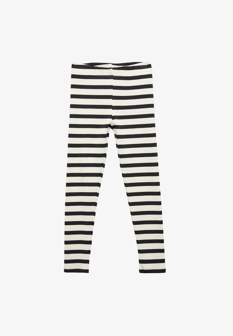 Randiga leggings i svart och vitt, tillverkade av mjukt tyg, med en åtsittande passform och en slät midjeband, lämpliga för avslappnad användning.