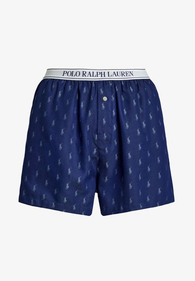 Navyblauwe katoenen boxers met een herhalend lichtblauw polo speler patroon, voorzien van een elastische tailleband met de tekst "POLO RALPH LAUREN".
