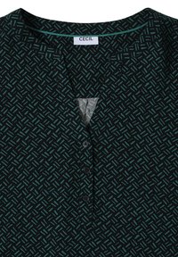 Schwarzes Oberteil mit einem geometrischen Muster aus türkisen Linien. V-Ausschnitt-Design mit fünf Knöpfen und einer weichen Textur. Das Etikett trägt den Schriftzug "CECIL."