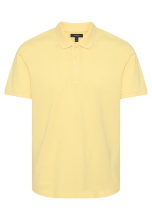 Polo jaune en coton, doté d'un col classique, d'une patte de boutonnage à trois boutons, de manches courtes et d'un ourlet droit.