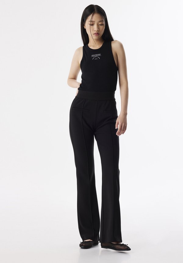 FLARE FIT - Stoffhose