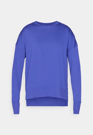 Paarse sweatshirt met lange mouwen, ronde hals en een licht gebogen zoom. Gemaakt van zachte, lichte stof met een gladde textuur.