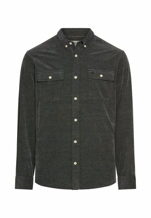Dark green corduroy shirt with a button-down collar, two chest pockets, and white buttons. Features fine vertical stripes. Regular fit.