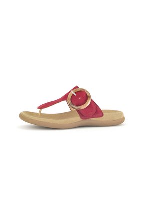 Red suede thong sandal with a rounded toe post, large wood-like buckle accent, and beige rubber sole. Smooth, flat footbed design.