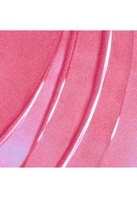 Traits de vernis à ongles rose pailleté brillant avec des lignes lisses et courbes et une surface brillante et réfléchissante.