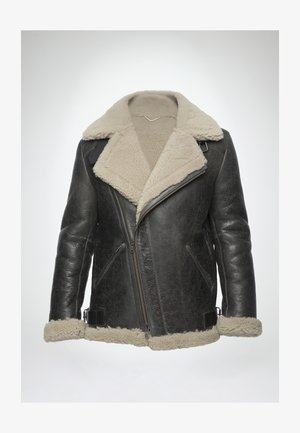 Veste en cuir noir avec un col et une doublure en fausse fourrure crème. Comprend une fermeture éclair à l'avant, des poches latérales et une finition texturée.