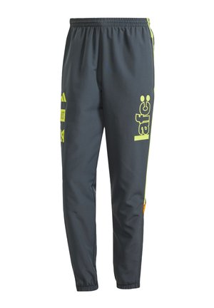 Dark gray athletic pants made from lightweight material. Features neon yellow branding and accents. Elastic waistband and tapered leg design.