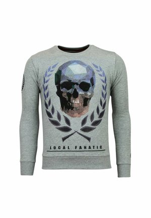Grijze long-sleeve sweatshirt met een geometrisch schedelontwerp, laurieraccenten en de tekst "LOCAL FANATIC" aan de onderrand.