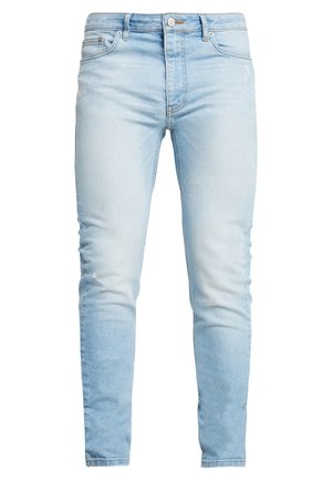 Light blue denim jeans with a slim fit, featuring a high waist and subtle fading, button closure, and five-pocket design.