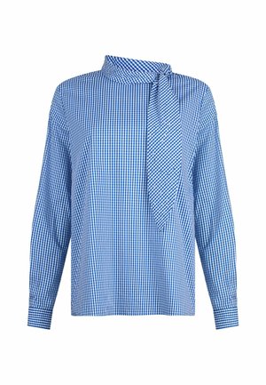 Blusa de manga larga de cuadros vichy azul y blanca con pañuelo de cuello incorporado atado a un lado, puños con botón y ajuste holgado.