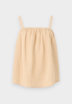 Ανοιχτό μπεζ τοπ χωρίς μανίκια με λεπτές ραμμένες τιράντες και χαλαρό, υφασμάτινο σχέδιο με υφή.